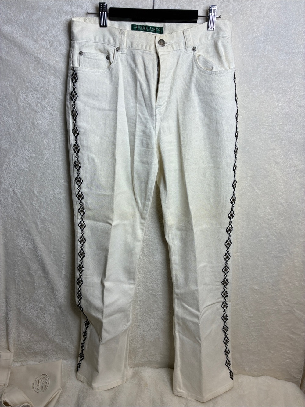 White womans Jeans with Black Side Embroidered Trim